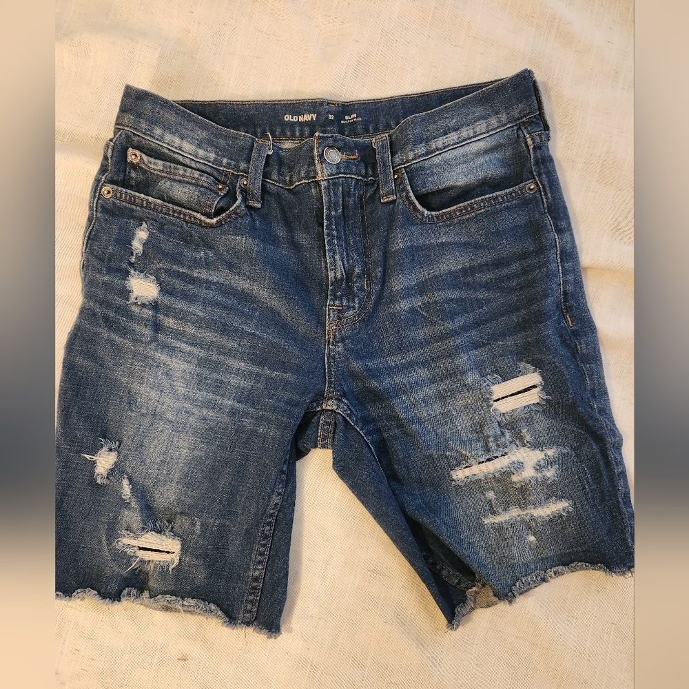 Medium Blue Distressed Jeans with Cut-Off Hem